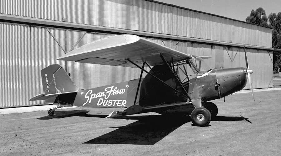An Aeronca Champion converted for agricultural crop-dusting, registration N2036E, with a spray tank fitted