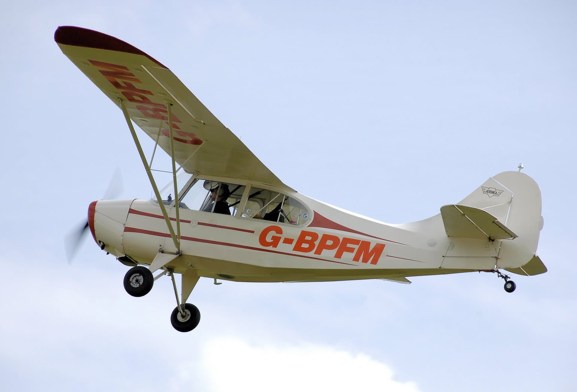 A yellow Aeronca 7AC Champion, registration G-BPFM, dated 1946, close front view