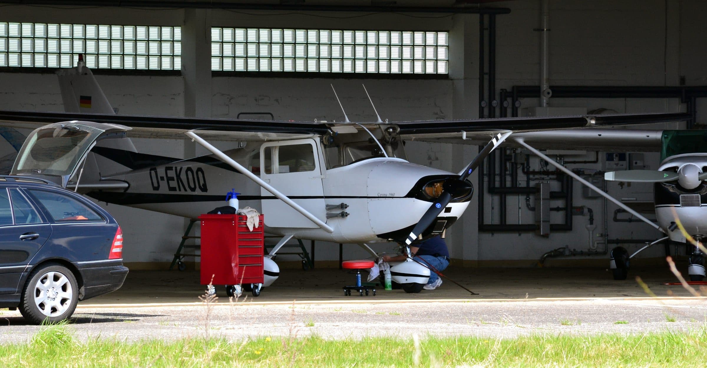 A Cessna 172A undergoing maintenance in a hangar