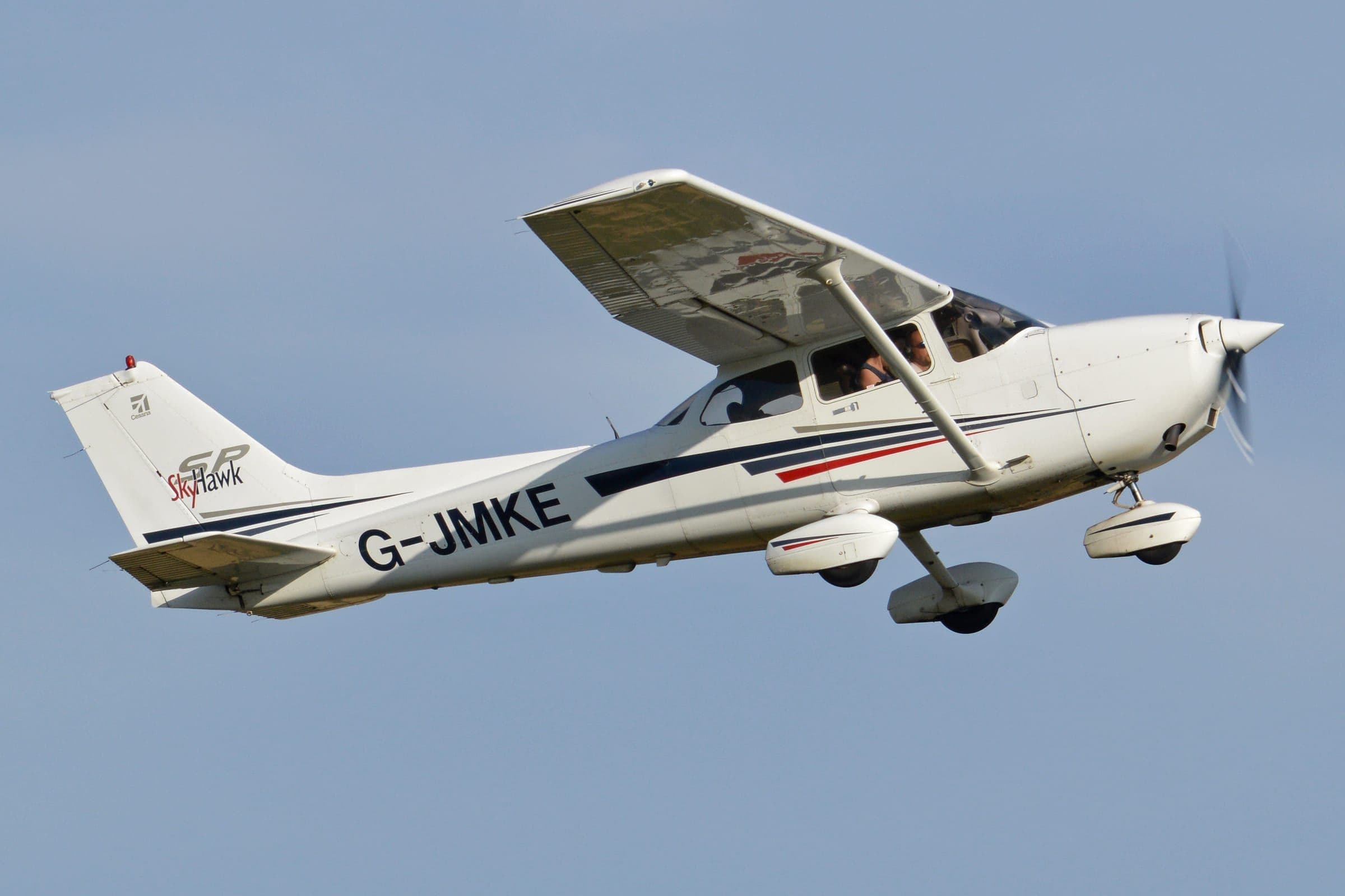 A Cessna 172S Skyhawk SP climbing away after takeoff