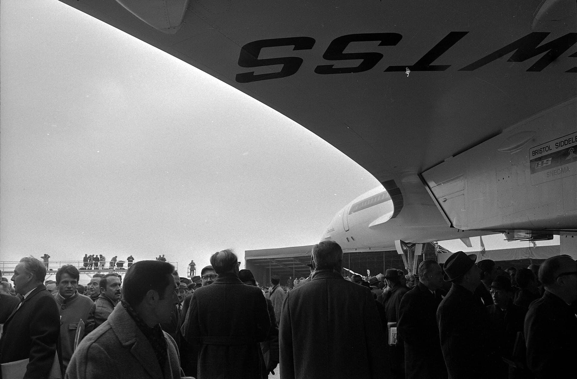 Guests beneath the wing of prototype 001 at its official presentation, Sud Aviation, Toulouse, 11 December 1967