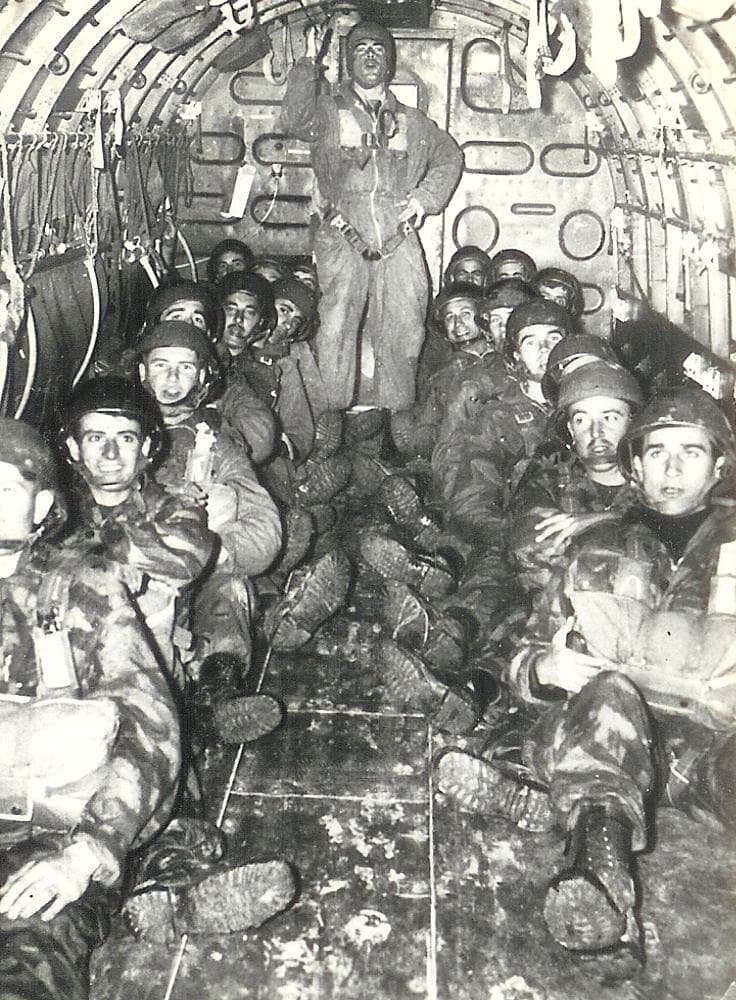 French paratroopers seated aboard a Douglas C-47, waiting to jump