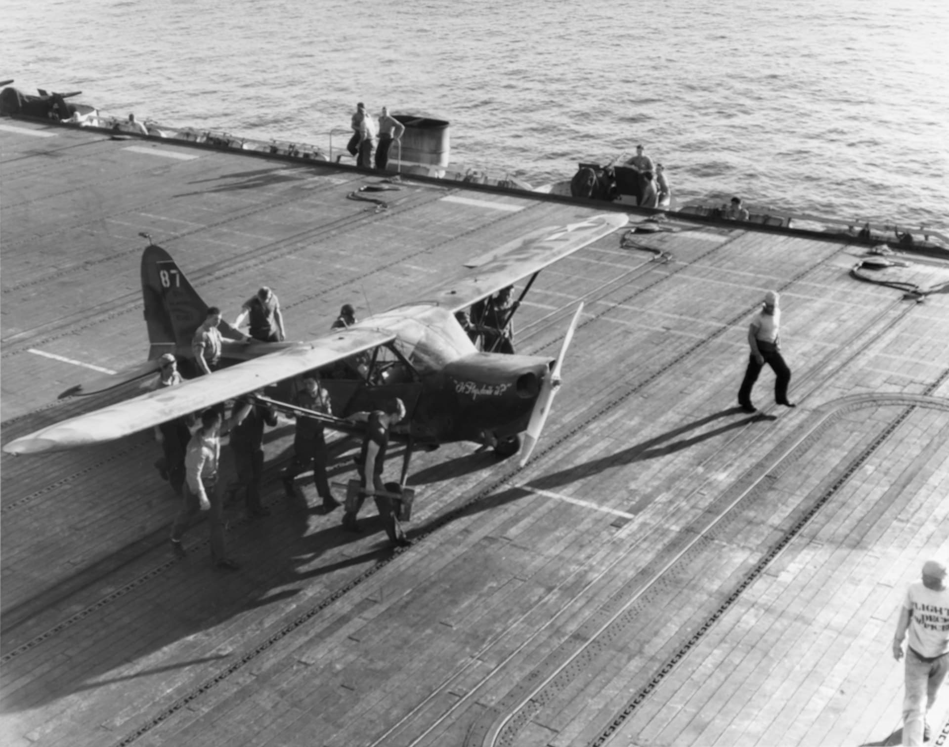 A Marine Corps Stinson OY-1 Sentinel aboard the escort carrier USS Petrof Bay off Peleliu, September 1944