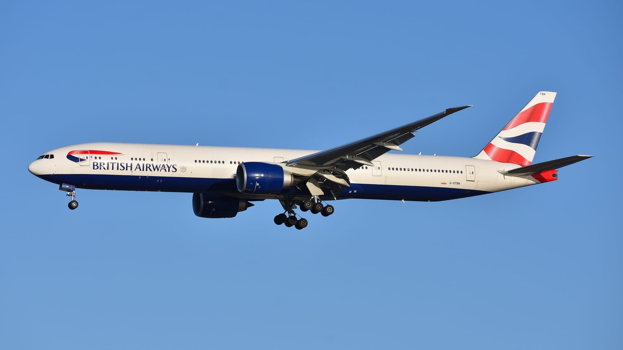British Airways Boeing 777-300ER G-STBN on final approach to Boston Logan in April 2022, arriving from London.