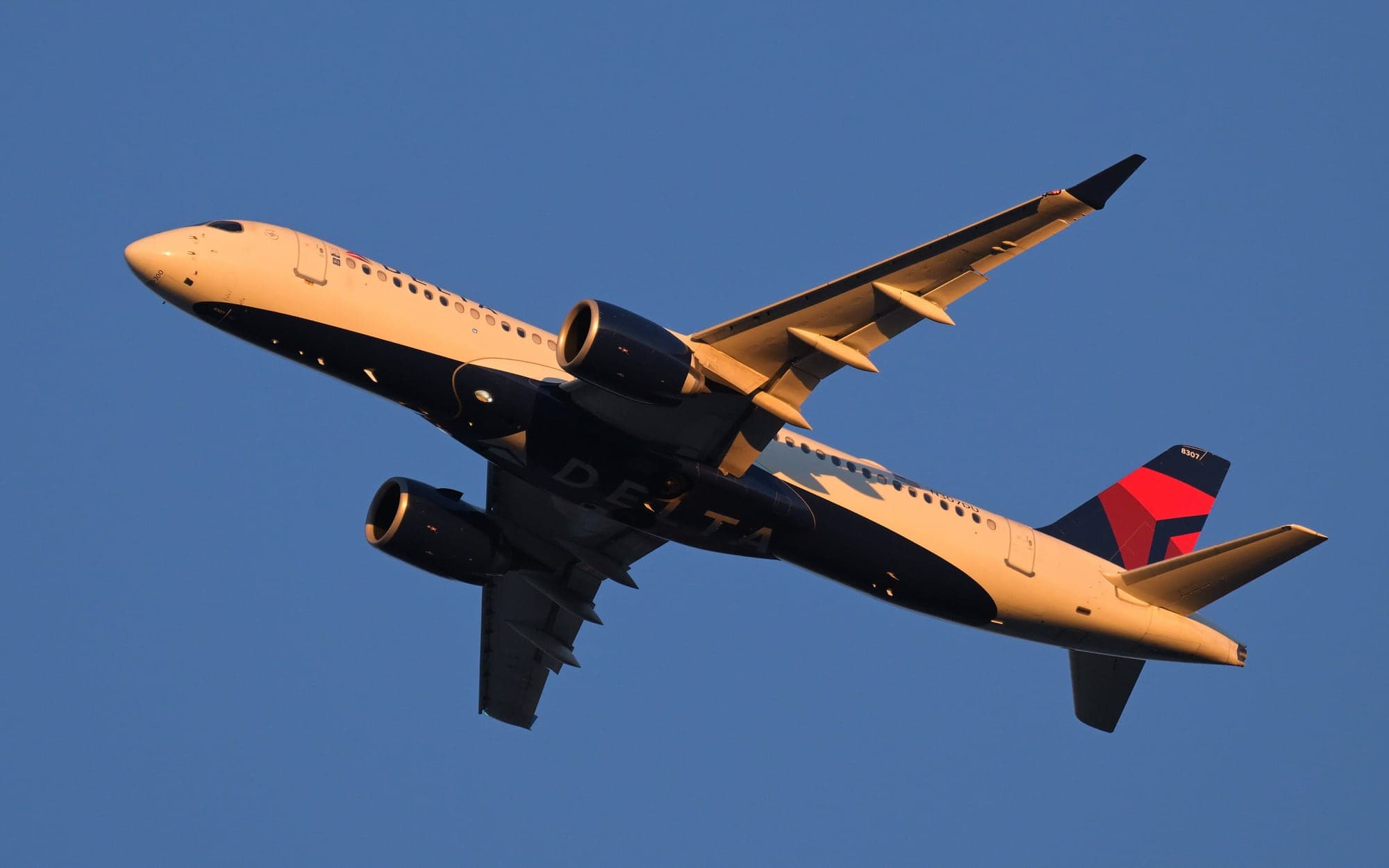 Delta Airbus A220-300 N307DU taking off from runway 33L at Boston in November 2025.