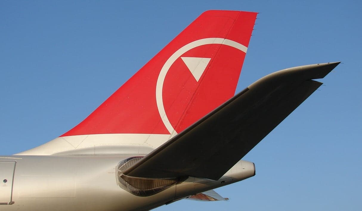 The tail and wing of a Northwest Airlines Airbus A330-200 at Minneapolis to St. Paul in September 2009, in the last months before the Northwest name was retired.