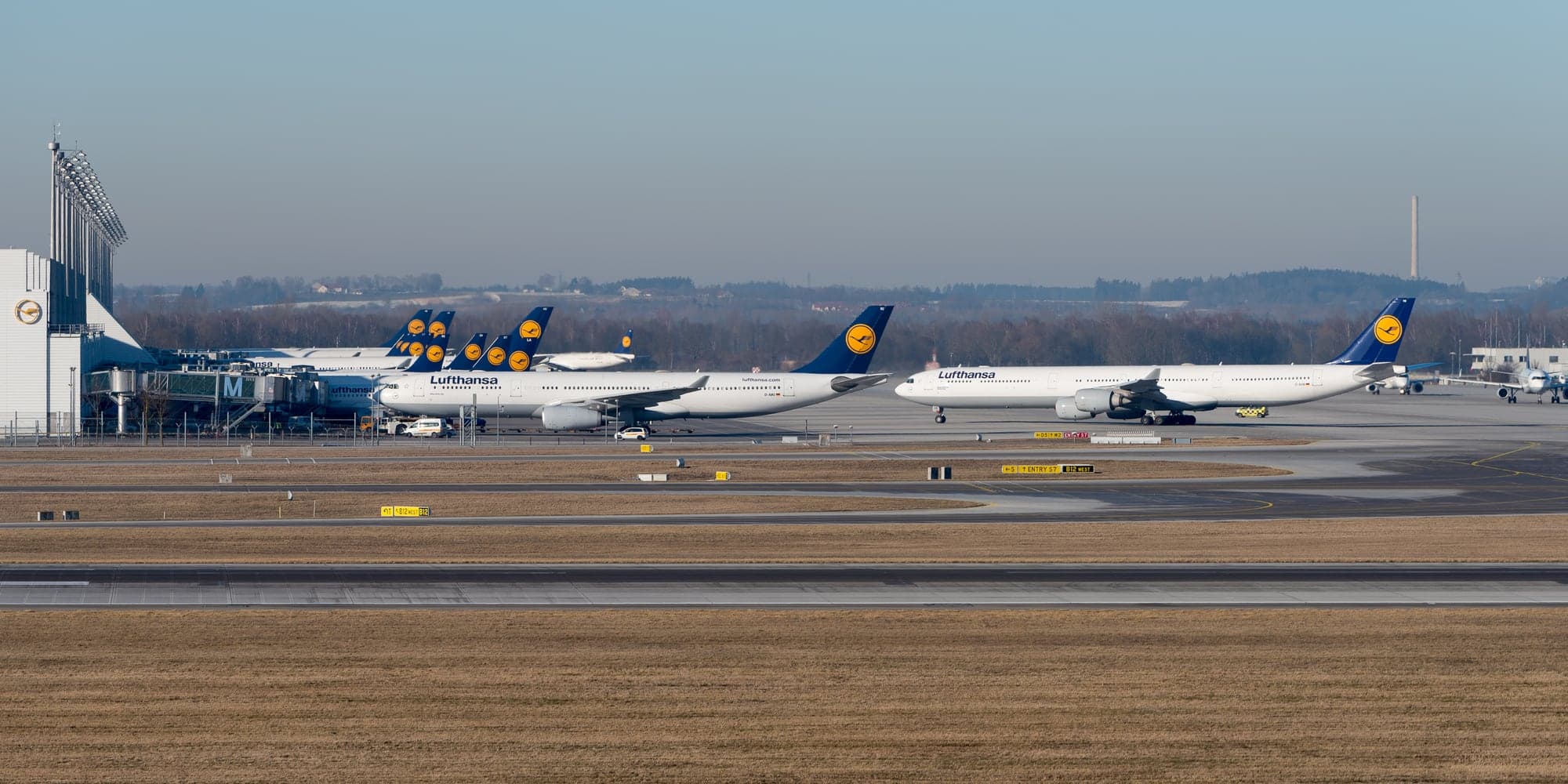 Terminal 2 at Munich Airport on a February afternoon in 2015, its stands filled with Lufthansa aircraft.