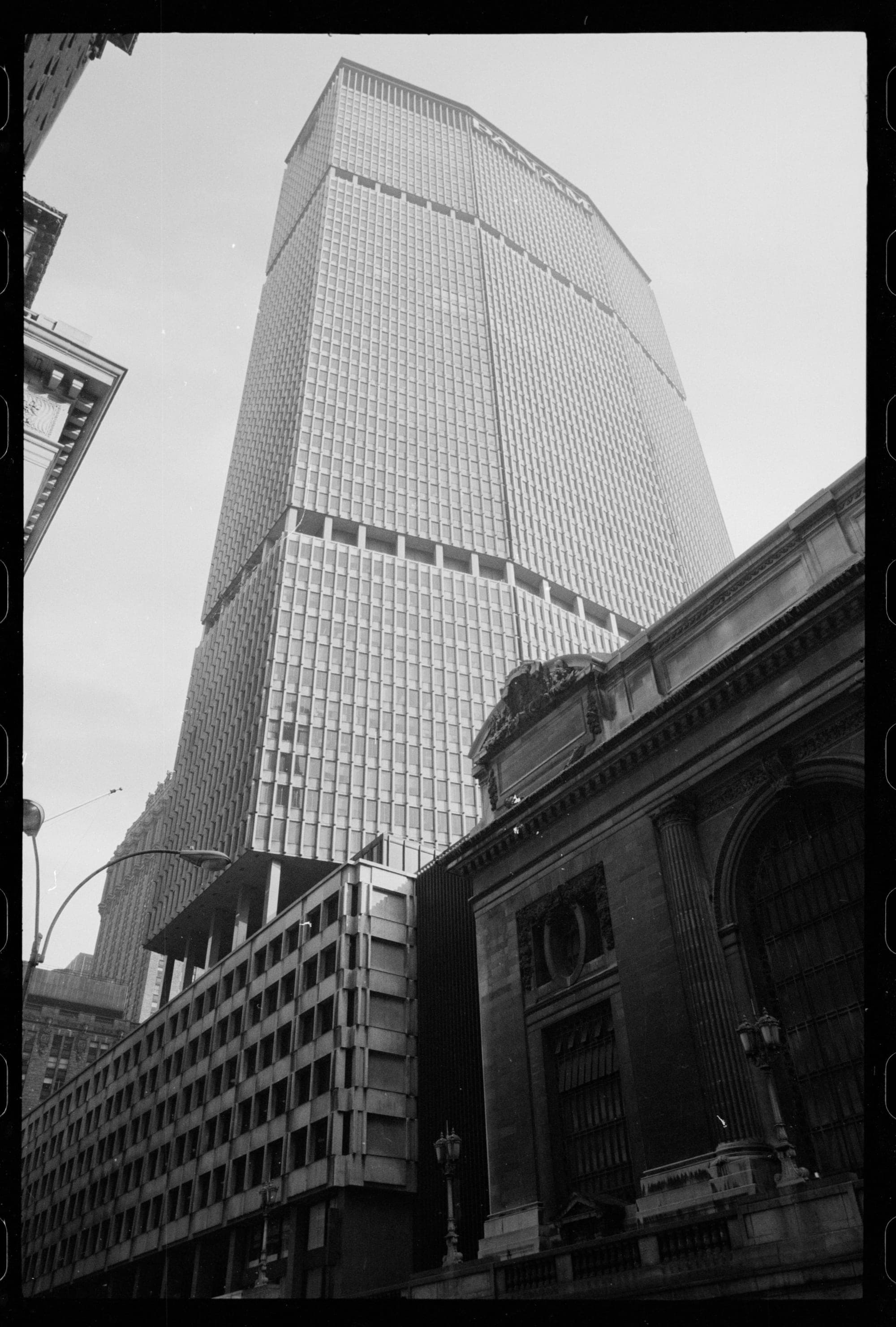 The Pan Am Building on Park Avenue in Manhattan, straddling Grand Central Terminal, with the airline's name across its top.