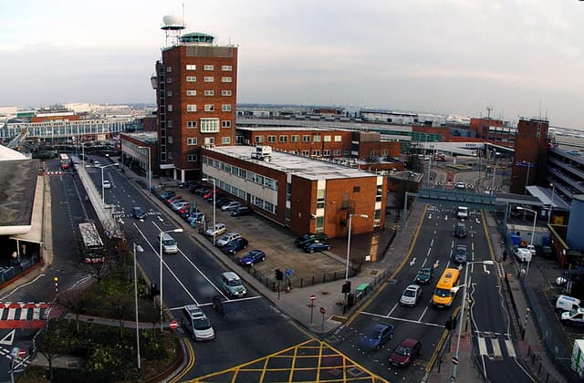 The 1955 control tower still standing among the central area's roads and car parks in 2006, long overtaken in height by the buildings around it