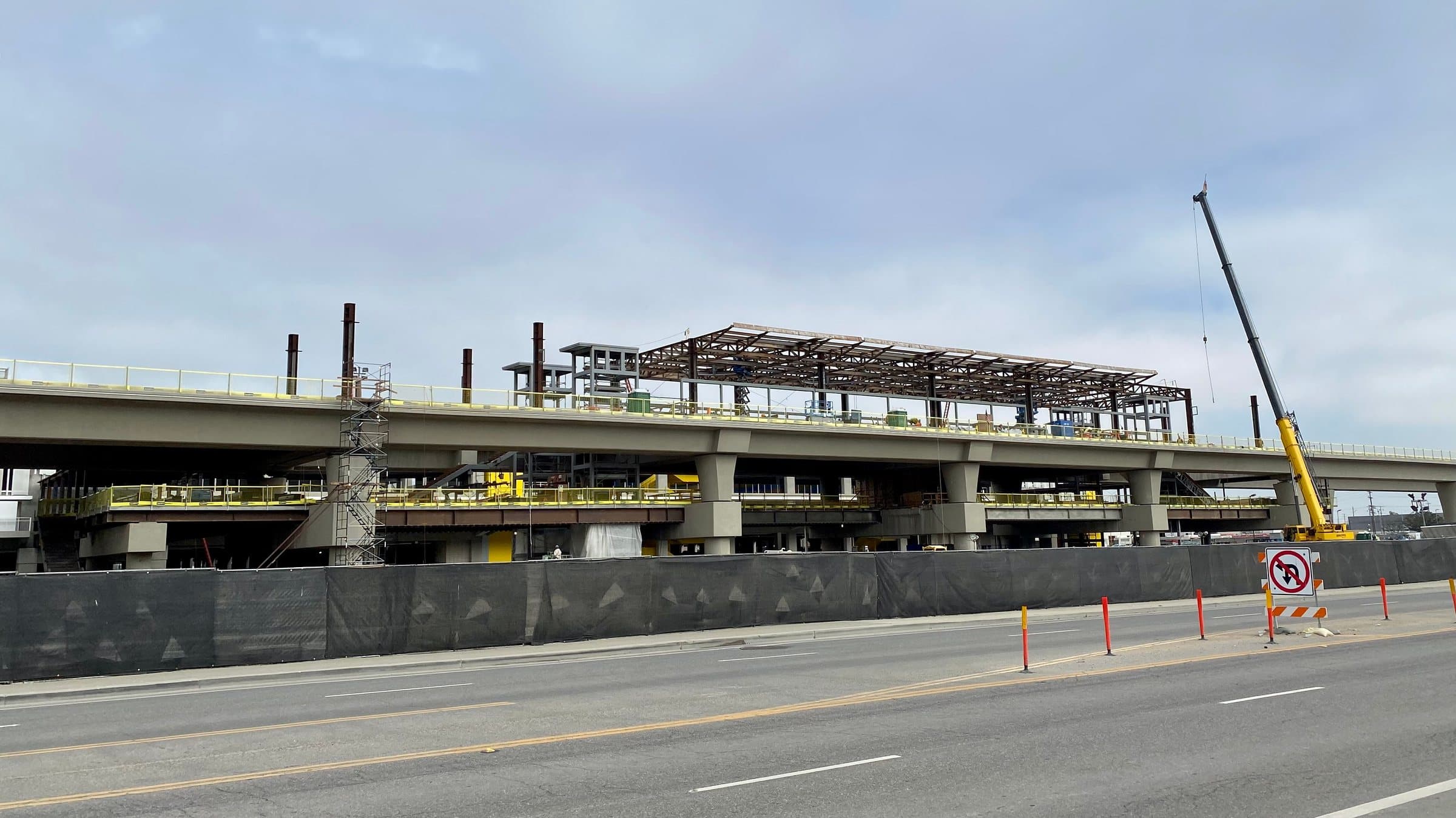 The SkyLink people mover's guideway and a station under construction in October 2021