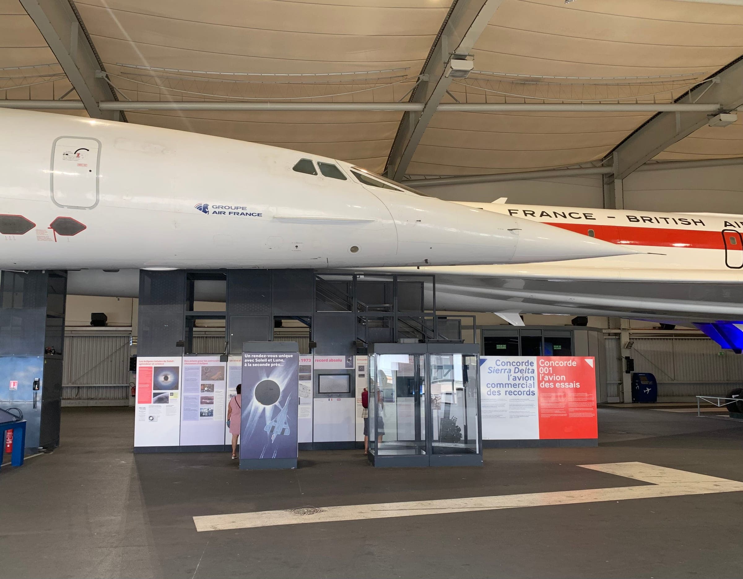 The noses of Concorde F-BTSD 'Sierra Delta' and the prototype 001 F-WTSS side by side in the museum's Concorde hall