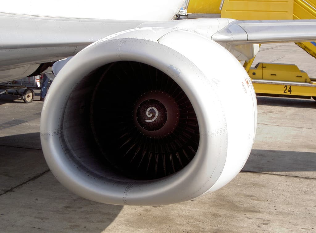 The intake of a CFM56-3 on a Boeing 737-400, its lower lip flattened to clear the ground