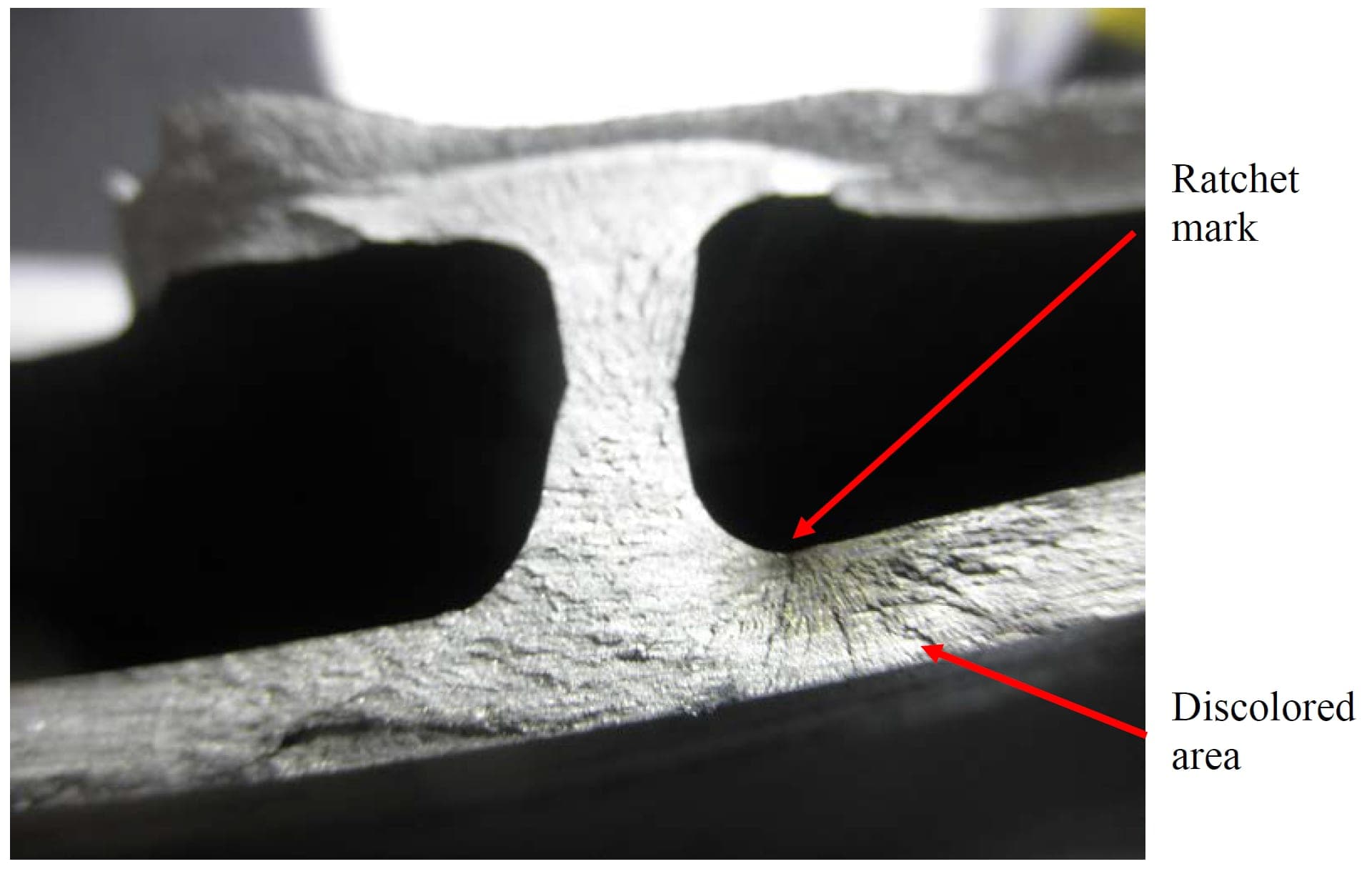 Close-up of the fan blade fracture surface from United Airlines flight 1175, photographed by the NTSB during investigation DCA18IA092