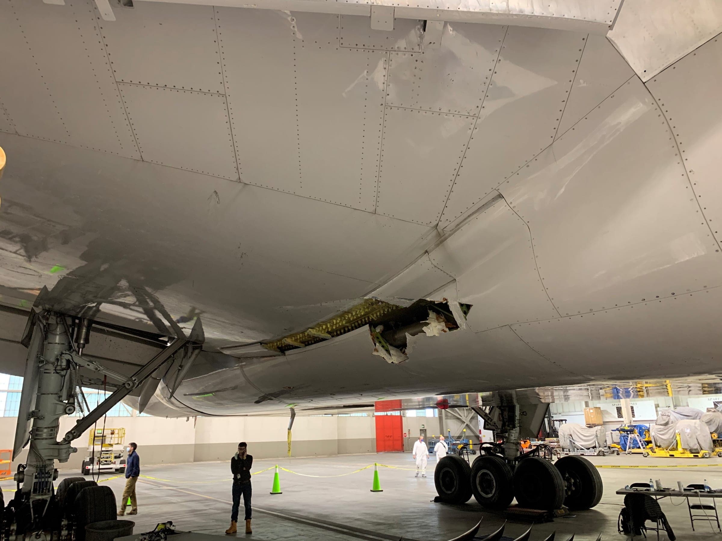 Damage to the wing and the right engine of United Airlines flight 328 after the fan blade failure of 20 February 2021