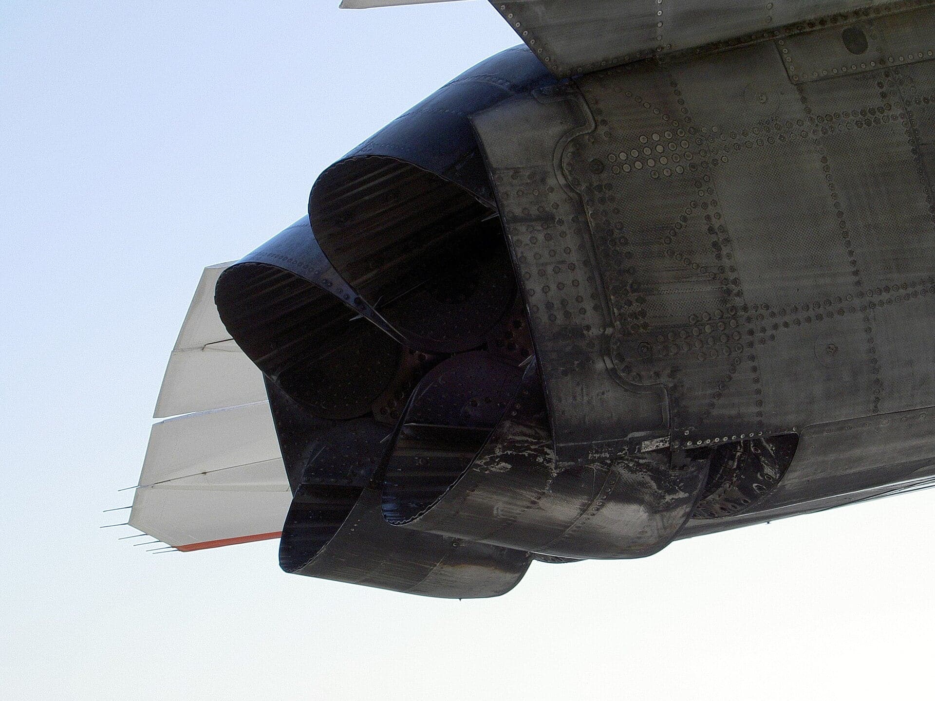 Concorde's paired exhaust nozzles from below, the secondary-nozzle “eyelids” forming the rear of the nacelle