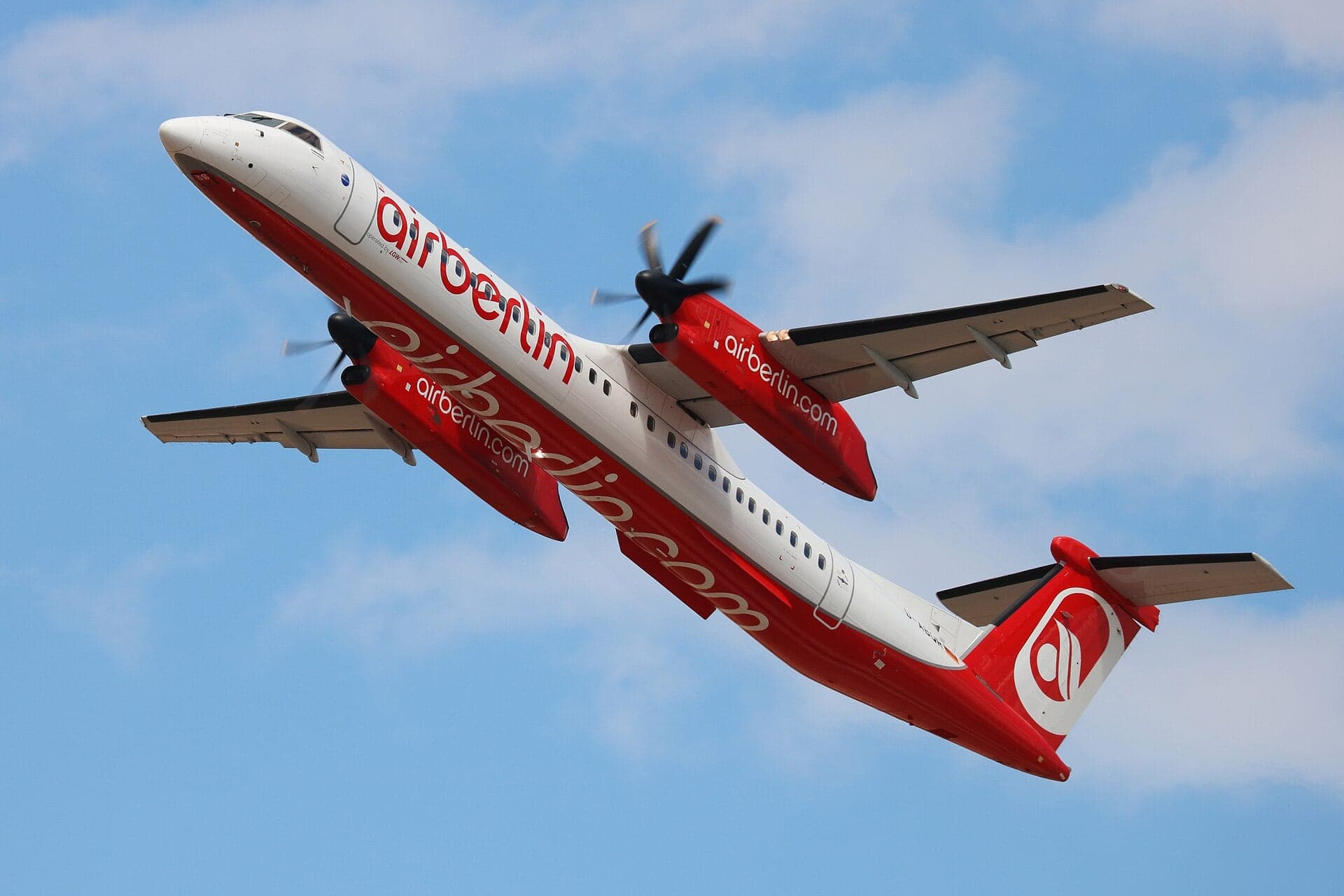 A Dash 8-400 turboprop in former Air Berlin colours, operated for Eurowings, at Düsseldorf