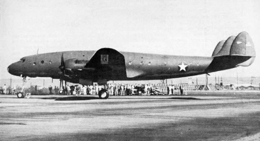 The prototype Lockheed Constellation, in olive drab, on the day of its first flight in January 1943