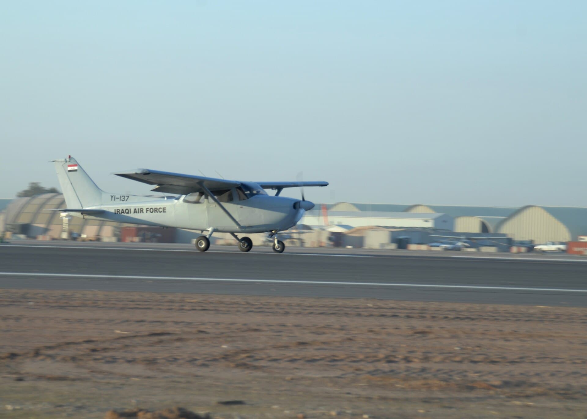 A Cessna 172S in Iraqi Air Force markings on a desert airbase runway in 2008, one of many air arms that adopted the type as a basic trainer